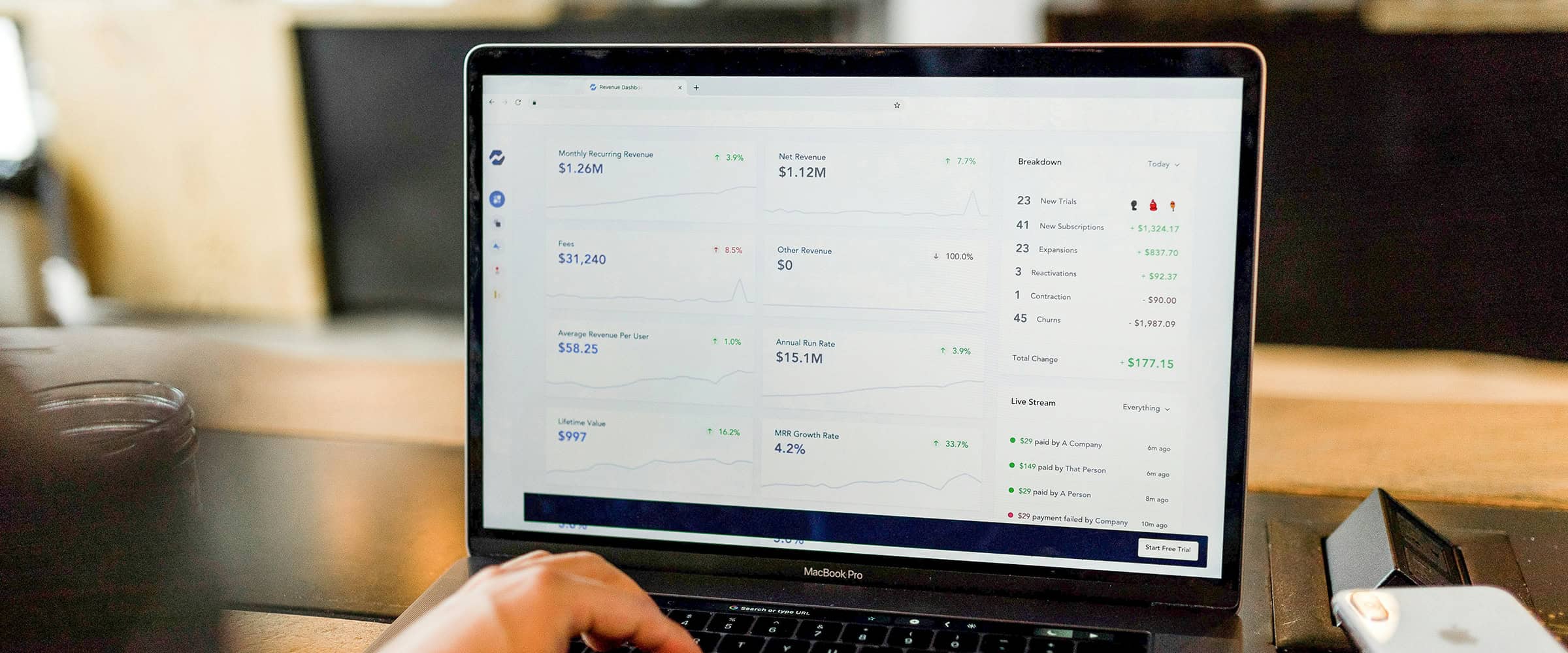 a laptop with an invoice document on the screen.